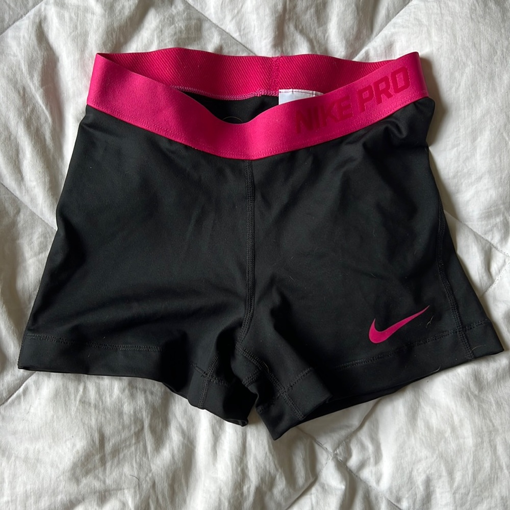 Nike Pro Dri-Fit Training Shorts with pink band.